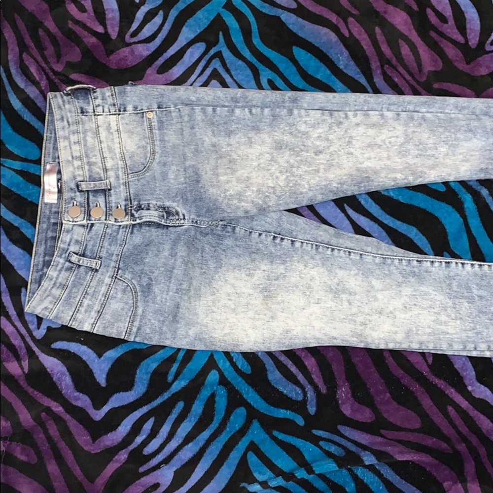 High waisted light blue denim jeans